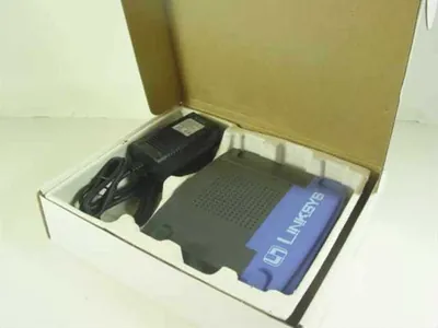 HPES03 - Cisco Linksys HomeLink Broadband Network Bridge 2 x 10Base-T LAN, 1 x 10Base-T Uplink Ethernet Bridge